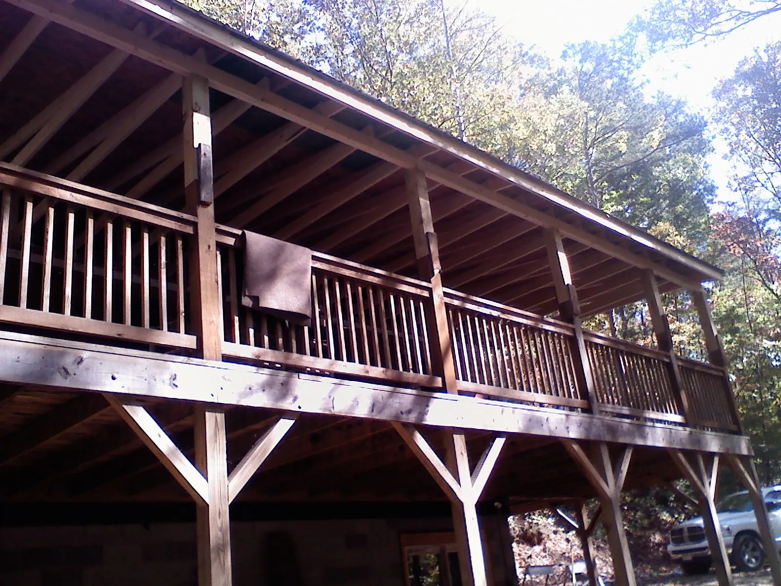 Timber framing under a new elevated porch and deck — Roof Leak Repair in Sharon by Roofing Brothers